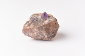 amethyst crystal grown on another stone ,marble, granite,