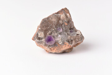 amethyst crystal grown on another stone ,marble, granite,