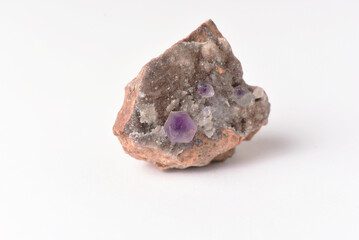amethyst crystal grown on another stone ,marble, granite,