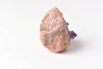 amethyst crystal grown on another stone ,marble, granite,