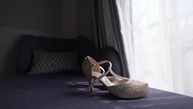 Women's wedding shoes, bridal heels luxury jewels, closeup arc shot