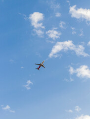 Shot of an airplane on blue sky background. Aviation