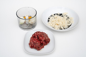 Ground meat, eggs, bread for meat balls.