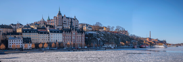 Old houses in shadow at the block Bastugatan in the district Södermalm a sunny winter day in Stockholm