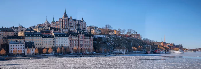 Photo sur Plexiglas Stockholm Old houses in shadow at the block Bastugatan in the district Södermalm a sunny winter day in Stockholm