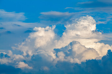 Blue summer sky with puffy clouds during a beautiful sunny day in Turkey. Sky with heavy cumulus clouds. Tranquil scene.