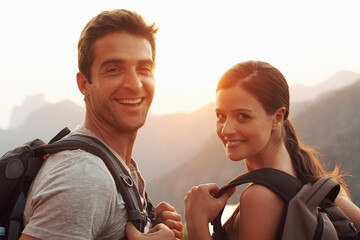 Backpacking...the perfect way to tour the globe. Cropped shot of a young couple touring a foreign city.