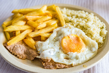 Bitoque, beef steak and fried egg with French fries, Portuguese cuisine