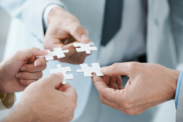 When a business plan comes together.... A business concept image of puzzle pieces fitting together...