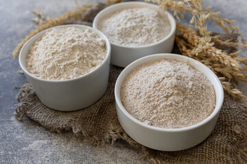 Food and baking ingredient. Wheat flour coarse from whole wheat grains, wheat bran and wheat flour...