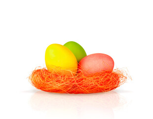 colorful Easter eggs in a bright nest of sisal