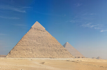 Fototapeta na wymiar Big pyramid in the empty place of the desert.