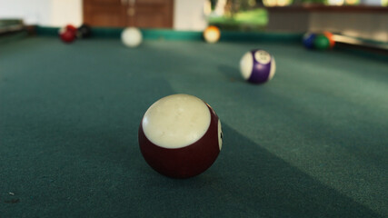 the focus object of a white-brown billiard ball