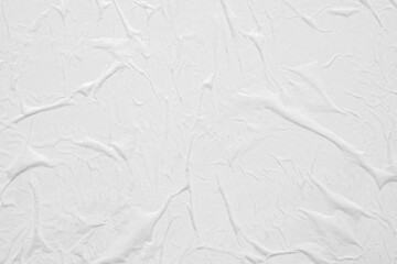 Blank white crumpled and creased paper poster texture background