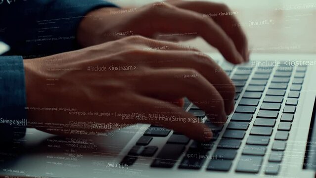 Computer programmer uses capable laptop computer to develop programming code of new software . Computer specialist working on future coding application for software programming development .