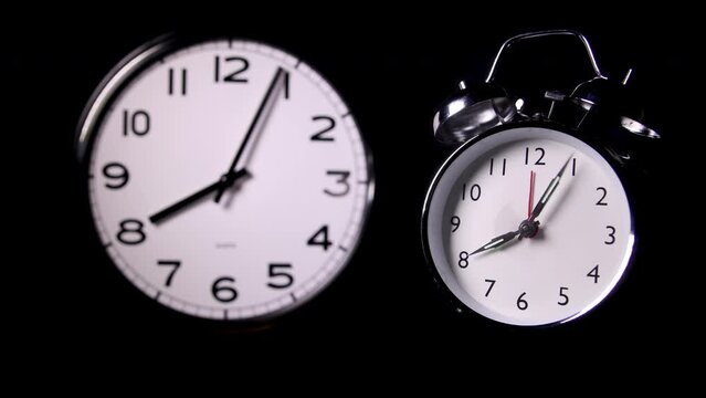 One modern and one traditional alarm clock covering 6 hours up to 12 o clock