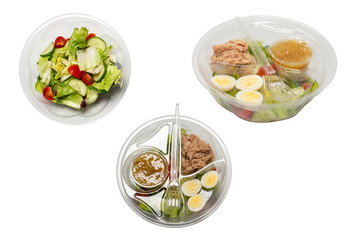 Salad with fresh vegetables isolated on a white background.
