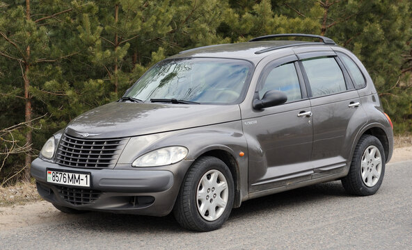 Belarus, Minsk-13.03.2022:Chrysler PT Cruiser car parked on the road in the forest. 