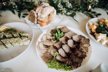 Festive table with different food at a wedding party