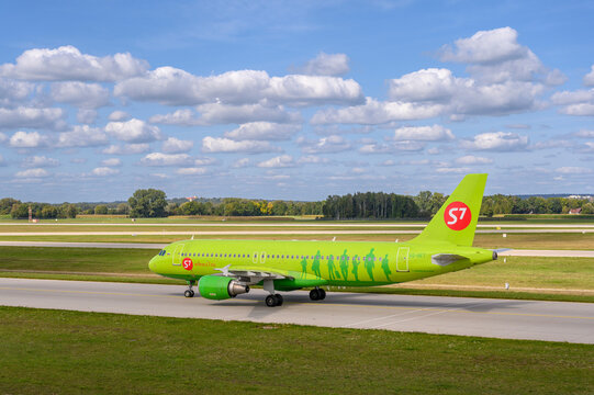 S7 Siberia Airlines Airbus A320-214 .with the aircraft registration VQ-BET.is taxiing for take off on the northern runway 08L of Munich Airport MUC EDDM