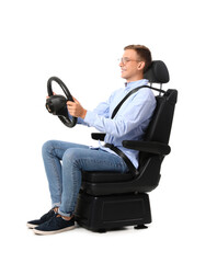 Man in car seat and with steering wheel on white background