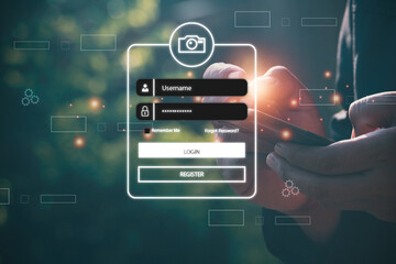 User typing login and password.Hand man use mobile phone for  log in to enter login and...