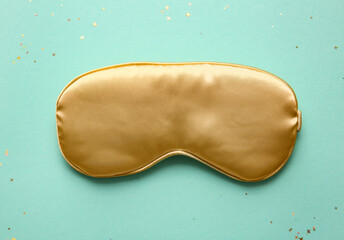Sleep mask on green background