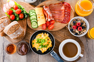 Breakfast served with coffee, scrambled eggs, cereals and ham