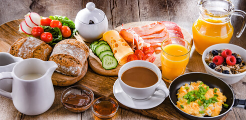 Breakfast served with coffee, scrambled eggs, cereals and ham - obrazy, fototapety, plakaty