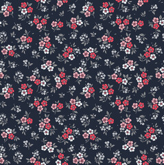 Vintage floral background. Floral pattern with small pink flowers on a dark blue background. Seamless pattern for design and fashion prints. Ditsy style. Stock vector illustration.