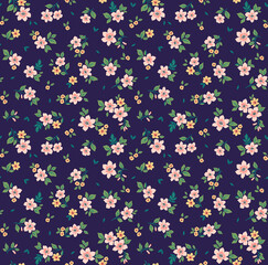 Fototapeta na wymiar Vector seamless pattern. Pretty pattern in small flowers. Small pastel orange flowers. Blue background. Ditsy floral background. The elegant the template for fashion prints. Stock vector.