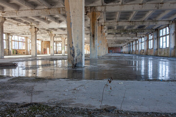 workshop of a closed enterprise without windows and with ice on the floor