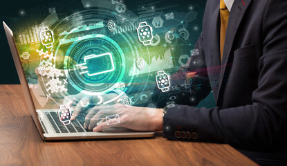 Business hand typing on a modern laptop