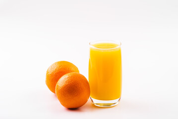 Orange juice glass with orange fruits. Isolated on white background. High resolution, copy space, healthy, vitamin drink
