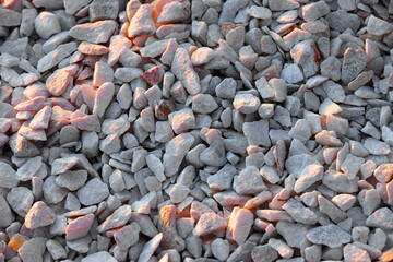 The texture of the limestone stone decoration. Grey stone background. Close-up.