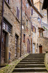 Anghiari, Arezzo, Tuscany, Italy - Typical medieval village with stone walls and ancient athmosphere during cloudy day.