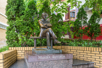 Monument to the writer Mikhail Bulgakov on Andreevsky Descent in Kyiv