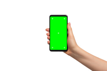 Smartphone with green screen in a woman's hand, isolated, copy space.