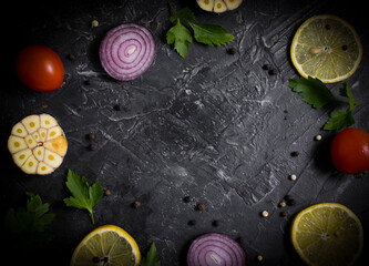 Fototapeta na wymiar onion, spices, garlic on the old background