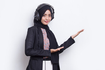 Asian muslim woman wearing hijab operator customer service pointing with fingers to different...