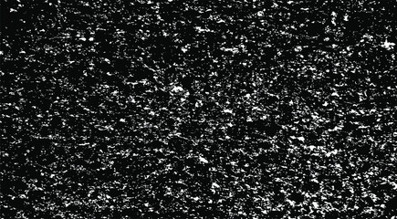 Small uneven spots and particles of debris. Abstract vector texture. Distressed uneven background. Grunge texture overlay with fine grains isolated on white background. Vector illustration. EPS10.