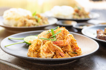 Pad Thai (Stir-fried rice noodles with shrimp) flavor with sugar, lime, ground dried chilies and peanuts; Thailand's popular dishes.