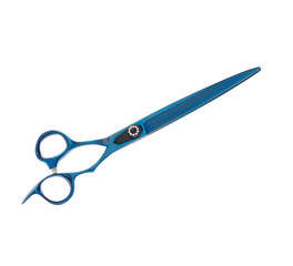 Scissors for cutting people and pets. Grooming scissors. Closed scissors on a white isolated background. Side view.