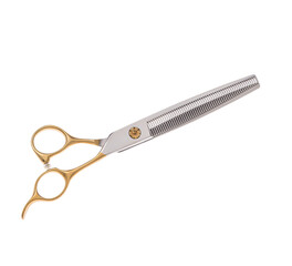 Scissors for cutting people and pets. Grooming scissors. Closed scissors on a white isolated background. Side view.