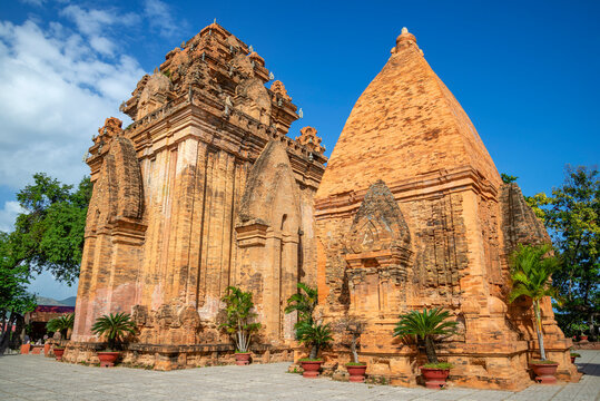 Two ancient Chaam towers of the temple complex Po Nagar on a sunny day. Nha Trang, Vietnam