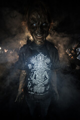 scary sorcerer in smoke. voodoo rite