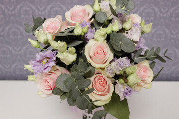 wedding rings and bridal bouquet close up top view morning bride