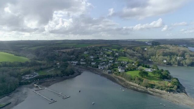 Stunning landscape view of Helford village on the river Helford, and farmland stretching inland