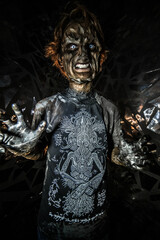 scary sorcerer in smoke. voodoo rite