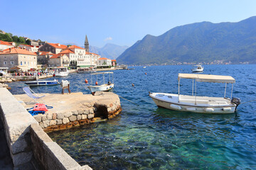 Fototapeta na wymiar Pier with boats in Perast, Montenegro